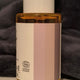 Berry Repair Oil huile régénérante certifiée COSMOS ORGANIC 30 ml présentée en avis client sur fond textile sombre – KALYAË ORIGIN