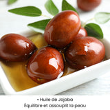 Huile de jojoba utilisée dans les soins KALYAË ORIGIN, reconnue pour équilibrer et assouplir la peau.